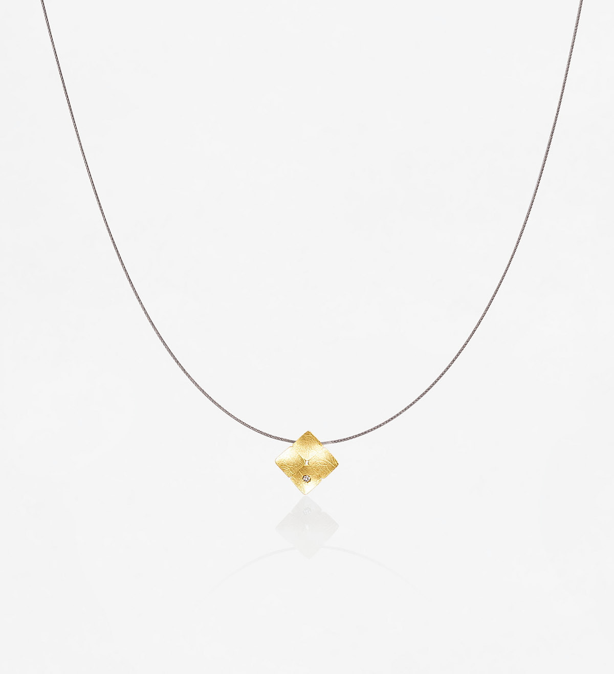 Colgante oro Ones 13mm con diamantes 0,025qts