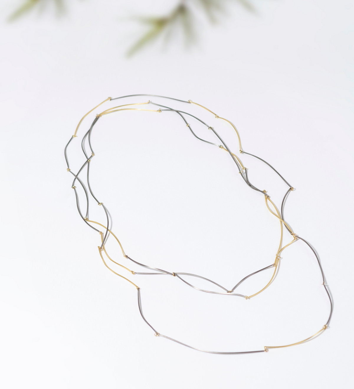 Collar oro y titanio Pinassa 258cm