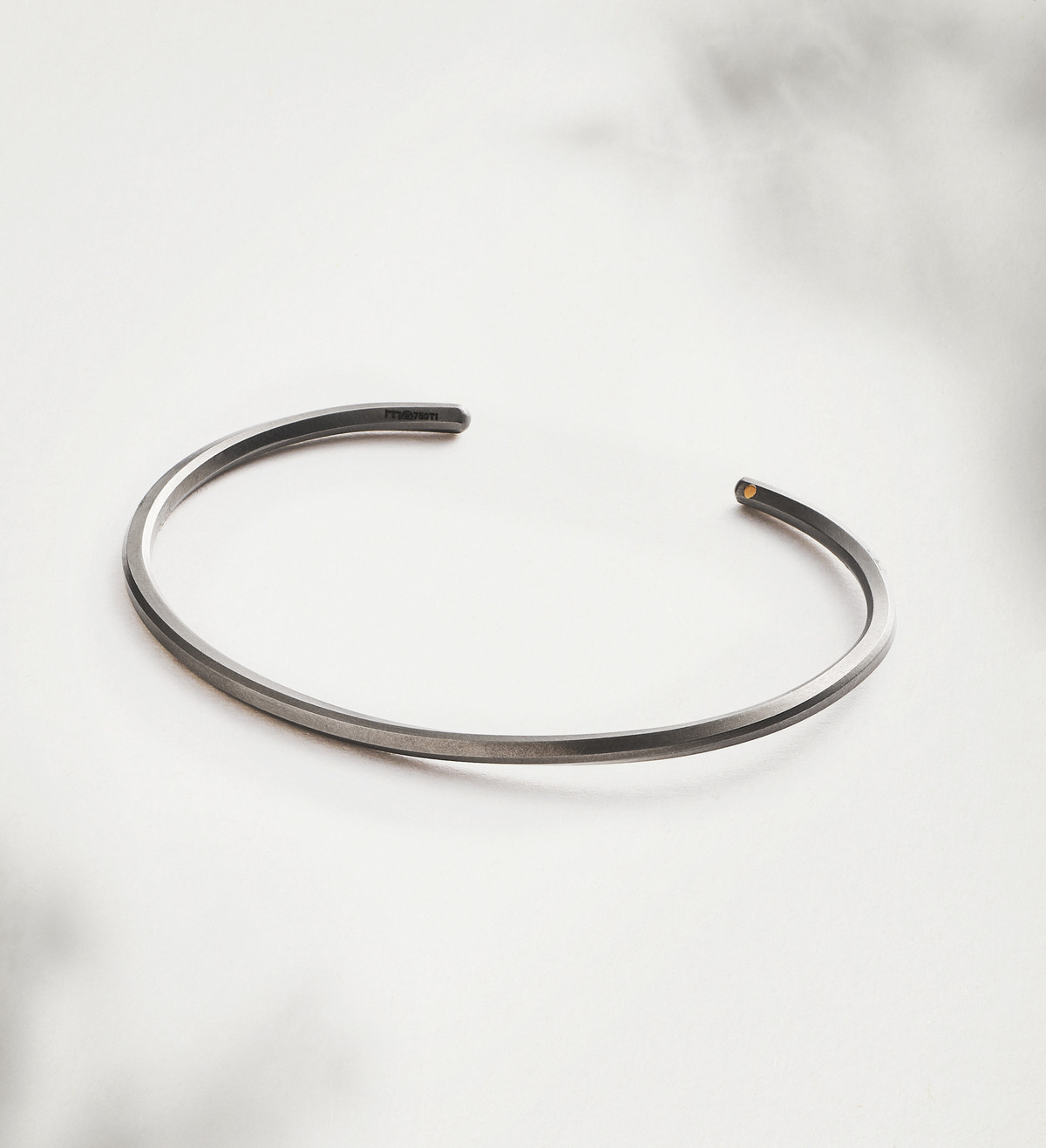 Pulsera oro y titanio Pinassa para hombre