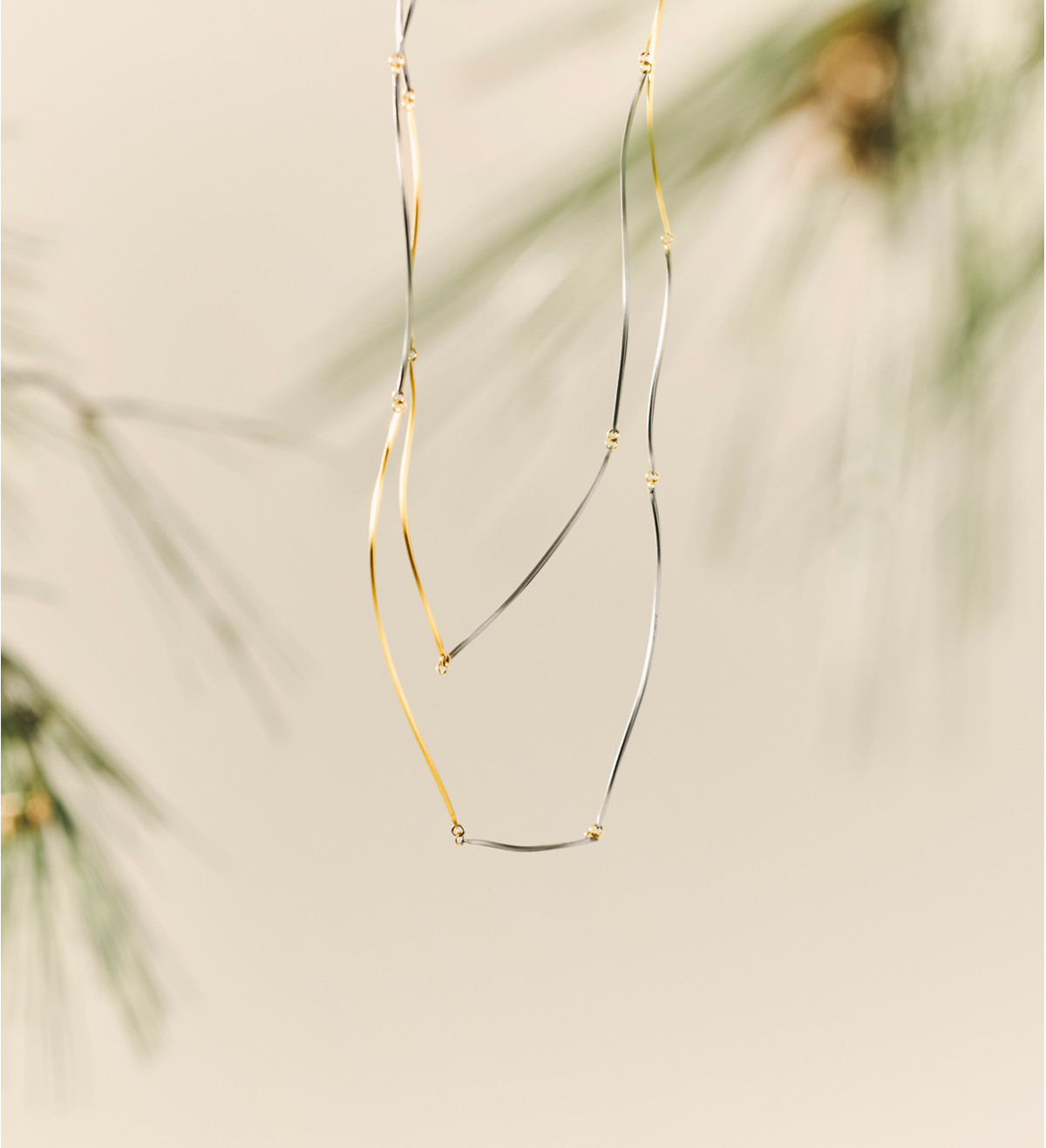 Collar oro y titanio Pinassa 126cm