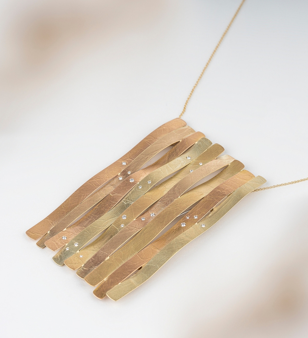 Colgante y broche Oceà en oro y diamantes (0,308 ct)